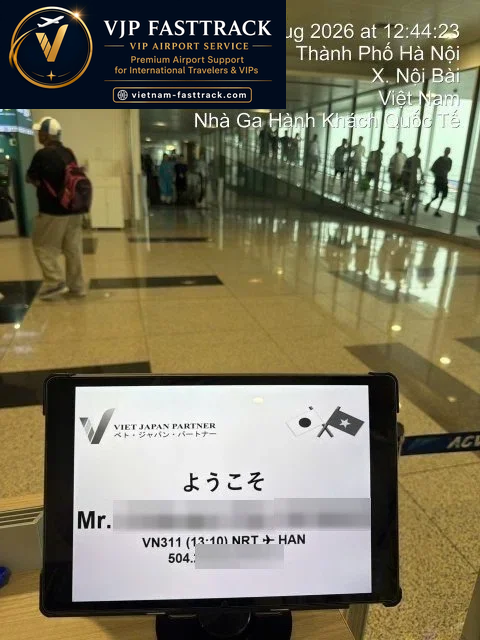 Passenger completing immigration after arriving on flight VN311 at Noi Bai Airport